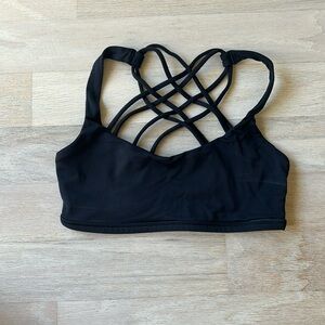 Lululemon black sports bra strapy back size 4